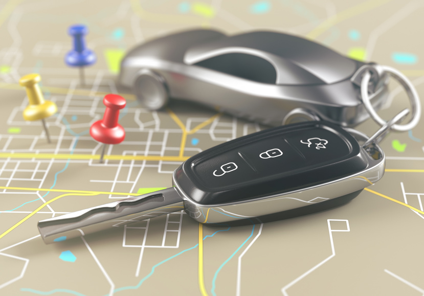Car key on the map with local points of travel.