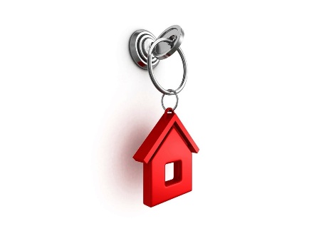 key with red house trinket in keyhole