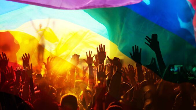 Silhouette,Of,A,Parade,Of,Gays,And,Lesbians,With,A